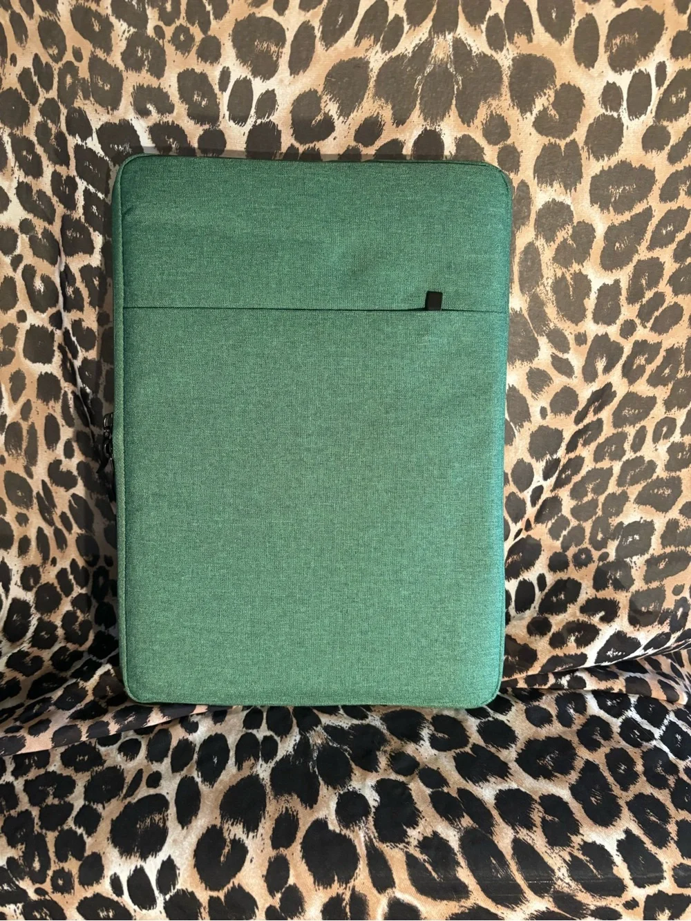 Apple Tablet with Multicolor Tree Skin and Green Keyboard Cover